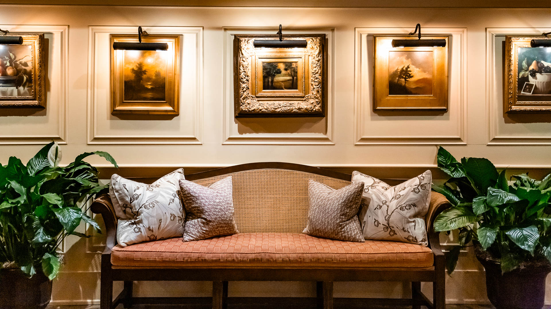 Cozy lounge seating area inside a luxury mountain retreat with soft lighting and comfortable chairs