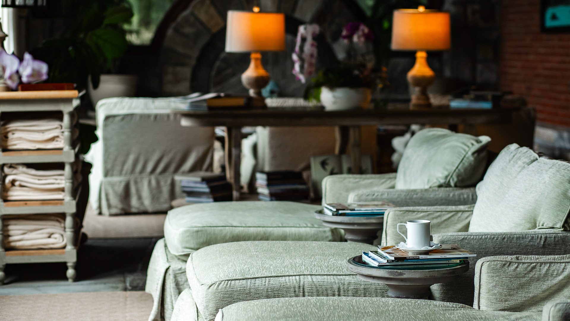 Soft lounge seating and warm lighting in a relaxing retreat interior space