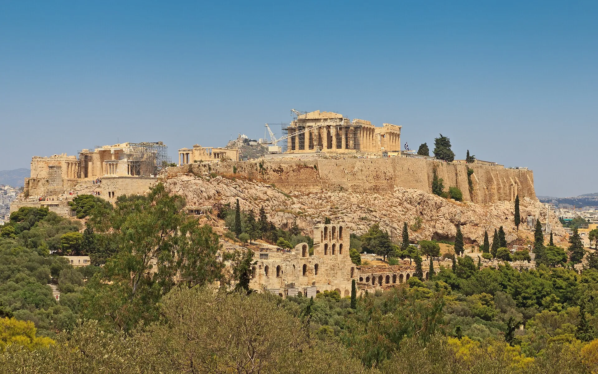 The Parthenon and the Acropolis of Athens seen above the city rooftops